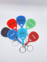 Ensemble de porte-clés en forme de raquette de padel de différents couleurs avec prénom